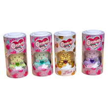 Quattro pupazzetti orsetto Coccolotti Love & Tell 4Ever in confezione cilindrica, colori verde, turchese, oro e lilla, con finestra trasparente
